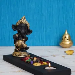 eCraftIndia Black & Golden Polyresin Baal Ganesha Dancing Showpiece & Fragnanced Petals and Tealight-image-69