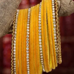 Zeneme Gold Plated CZ Studded Yellow Velvet Bangles for Women Set of 18-image-94