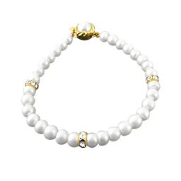Sri Jagdamba Pearls Floral Golden Alloy Classic Bracelet-40