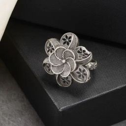 NVR Women Silver-Toned Floral Shape Adjustable Finger Ring-image-99