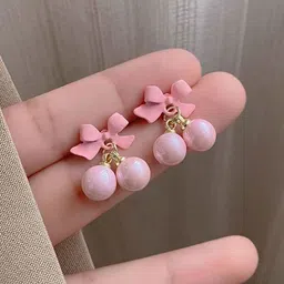 VAGHBHATT Gold-Plated Pearls Studded Bow Shaped Studs image 2