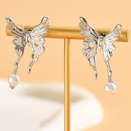 VAGHBHATT Silver-Plated Pearls Studded Wings Shaped Studs-26