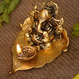 Aura Yellow Textured Metal Lord Ganesha With Diya-picture-24