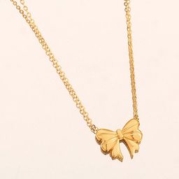 Jewels Galaxy Gold-Plated Anti Tarnish Stainless Steel Bow Shaped Pendant with Chain-image-33