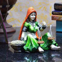 eCraftIndia Orange & Green Polyresin Rajasthani Lady Statue With Weighing Scale Showpiece-27