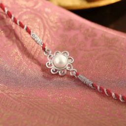 Ornate Jewels 925 Silver Freshwater Pearl Designer Thread Rakhi for Brother with Roli Chawal-image-11