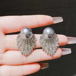 SEAA ENTERPRISES Silver-Plated Stones Studded and Beads Beaded Contemporary Stud-28