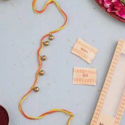 Fabindia Gold-Plated Red Brass Ghungroo Dokra Rakhi with Roli Chawal-image-38