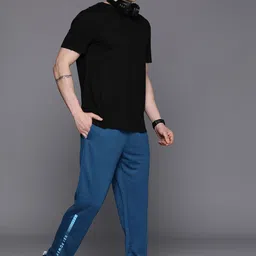 HRX by Hrithik Roshan Men Solid Lifestyle Track Pants-image-35