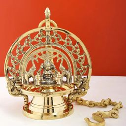 Exotic India Gold-Toned Brass Gajalakshmi Oil Lamp-image-56