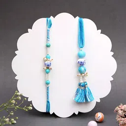 Myntra Elegant Homes Set Of 2 Rakhis With Greeting Card & Roli Chawal-image-10