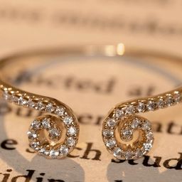 Rukhmani Gold-Plated American Diamond Studded Spiral Shaped Adjustable Finger Ring-32