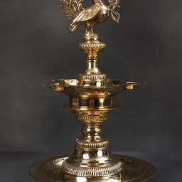 Exotic India Gold Toned Brass Peacock Oil Lamp Stand-image-24