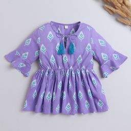 The Magic Wand Cotton Three Fourth Bell Sleeves Ikat Printed Gathered Top With Tassels - Purple-picture-23