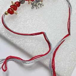 Maansh Artificial Beaded Elephant Thread Rakhi-image-0