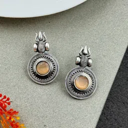 NAMAN ARTS Silver-Plated Artificial Stones Studded Circular Shaped Oxidised Drop Earrings-image-86