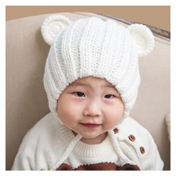 MOMISY Knitted Woolen Earlap Cap With Knot White - Circumference  48 cm-image-0
