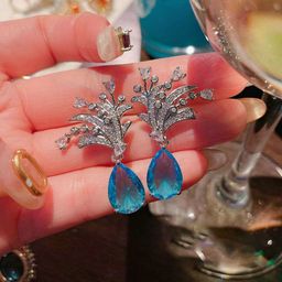 Designs & You Silver-Plated American Diamond Studded Teardrop Shaped Drop Earrings-8