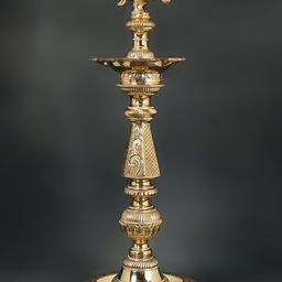 Exotic India Gold-Toned Peacock Lamp Textured Brass Pooja Diya-image-24
