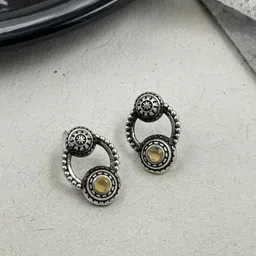 NAMAN ARTS Silver-Plated Artificial Stones Studded Circular Shaped Oxidised Drop Earrings-image-87
