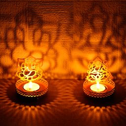 eCraftIndia Set Of 2 Golden Metal Lord Ganesha And Goddess Lakshmi Shadow Tea Light Holders-picture-1