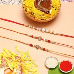 eCraftIndia Red, Golden & White Pearl, Om, Lord Ganesha Rakhis with Roli Chawal Pack - Set of 3-30