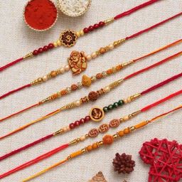 eCraftIndia Multicolor Om, Ganesha, Swastik, Rudraksha & Pearl Rakhis with Roli Chawal - Set of 7-2