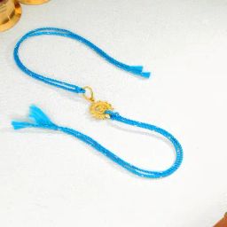 P.N.Gadgil Jewellers 22k Sacred Om Gold Blue Thread Rakhi-image-30