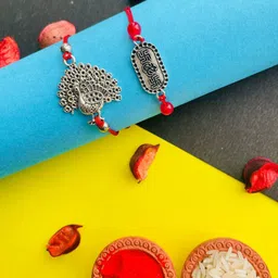 Crunchy Fashion Kids Silver Peacock Shaped Oxidised Thread Rakhi-image-83