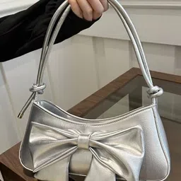StyleCast Structured Handheld Bag with Cut Work image 1