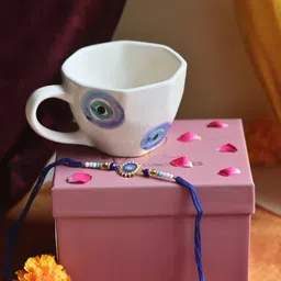 WEAVING HOMES Evil Eye White & Blue Printed Ceramic Mug 220ml With Beaded Rakhi-image-10