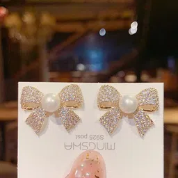 Celestique Cubic Zirconia Studded Pearls Beaded Bow Shaped Studs-51