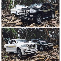 Magicwand 1:24 Scale Die-Cast Toy Prado with 6 Openable Doors,Pull Back Action,Working Lights & MusicColors as Per StockPack of 1-23
