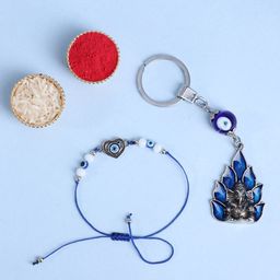 Floweraura Rakhi With Lord Ganesha Idol Evil Eye Key Chain Gift Set-image-54