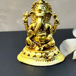 Aakrati Yellow Lord Ganesha Idol Brass Showpiece-54
