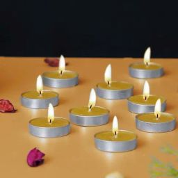 eCraftIndia Yellow Wax Lemon Scented Tea Light Candles - Set of 10-image-1