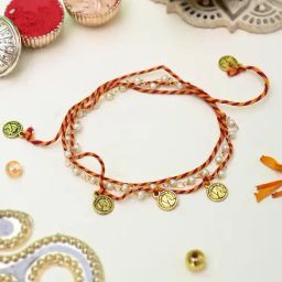 Aapno Rajasthan Pearl & Metal Coints Braided Elegant Rakhi with Pearls-image-60