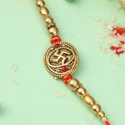 Aapno Rajasthan Golden Swastik Pearl Rakhi-33