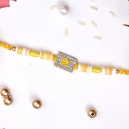 Aapno Rajasthan Yellow Smiley Stone Studded Rakhi-30