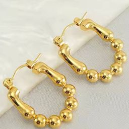 Lady Raiment Stainless Steel Gold Plated Oval Shaped Hoop Earrings-17