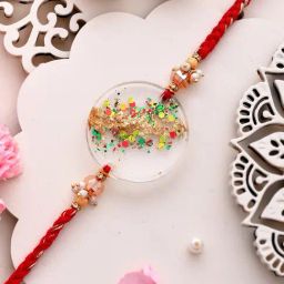 Aapno Rajasthan Multicolor Resin Designed Red Pleated Single Rakhi-image-37