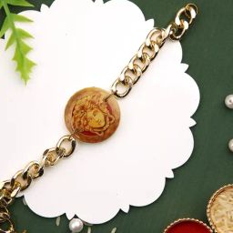 Aapno Rajasthan Elizabeth Resined Chained Metal Amused Rakhi-38