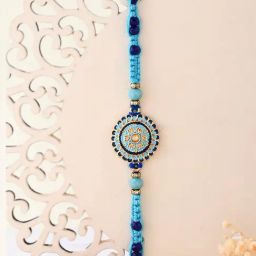 Aapno Rajasthan Gold Floral Blue Enameled Single Rakhi-image-81