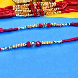 ORANGENYSHA Set Of 12 Beaded Cotton Thread Rakhis With Rholi Chawal-image-67