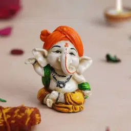 eCraftIndia White Polyresin Hcrafted Dancing Lord Ganesha Idol While Sitting Showpieces-image-63