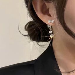 Celestique Artificial Stones Studded Bow Shaped Drop Earrings image 4