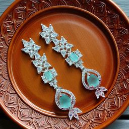 The Pari Rhodium-Plated American Diamond Studded Teardrop Shaped Drop Earrings-image-79