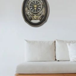 RHYTHM Black Plastic Elegant Oval Shaped Melodies In Motion Wall Clock-image-84