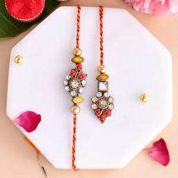 Aapno Rajasthan White Kundan Floral Red & Yellow Bhaiya Bhabhi Rakhi-image-86