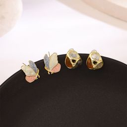 Yellow Chimes Set Of 2 Butterfly Shaped Studs Earrings-50